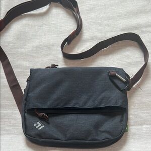 Outdoor Bag with Adjustable Strap and Flap.